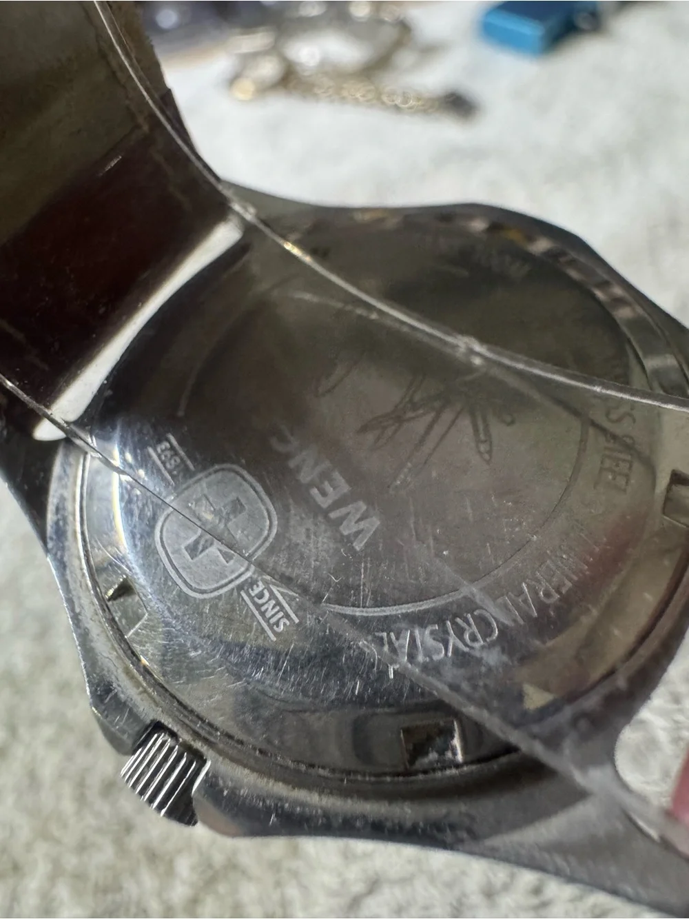 Wenger White Dial Watch with Brown Strap and Red Accent
